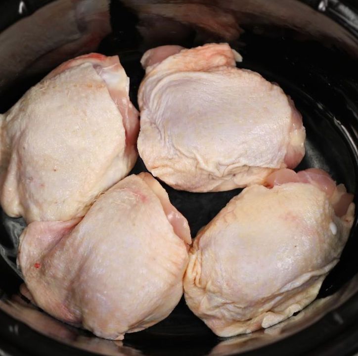 Put chicken in a slow cooker, but what goes on top turns it into an irresistible family meal